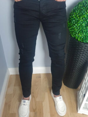 Czarne spodnie jeansowe męskie z przetarciami
